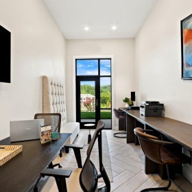 a room with a table and chairs